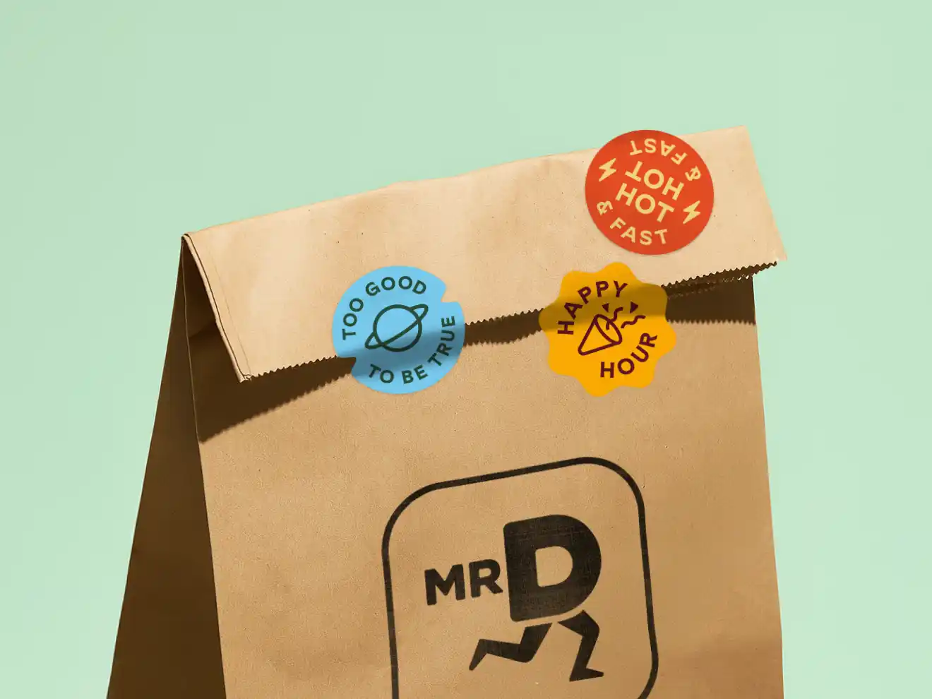 Mr D Brand Refresh brown bag and playful sticker designs